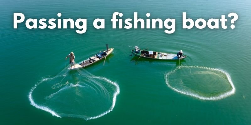 How should you pass a fishing boat